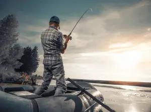 Mature man fishing on the lake