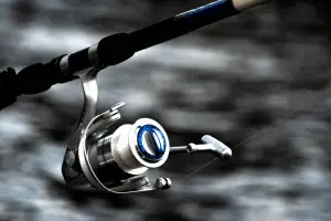 Fishing Reel with water in the background