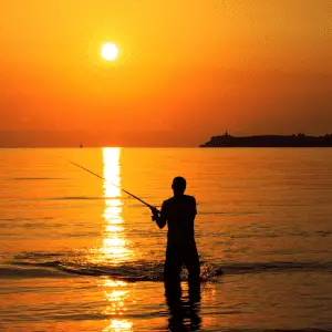 Man fishing in a boat