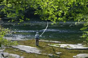 senior man fishing on the river