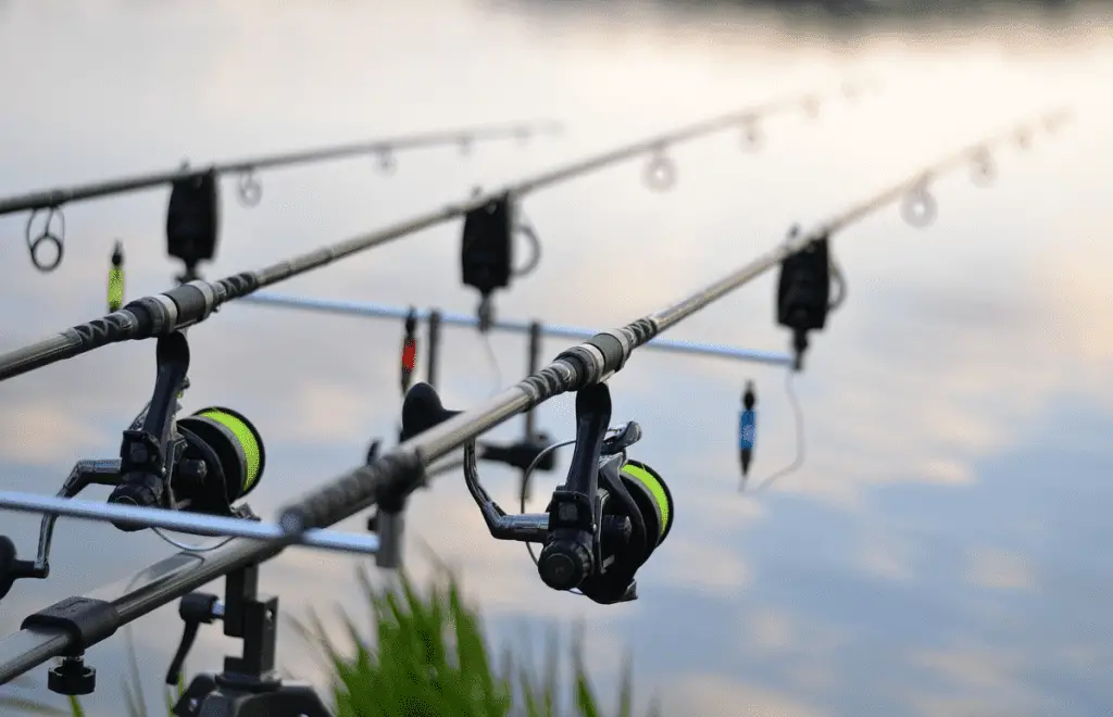 three fishing reels next to each other