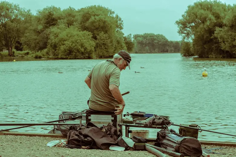 angler fishing from the lake shore