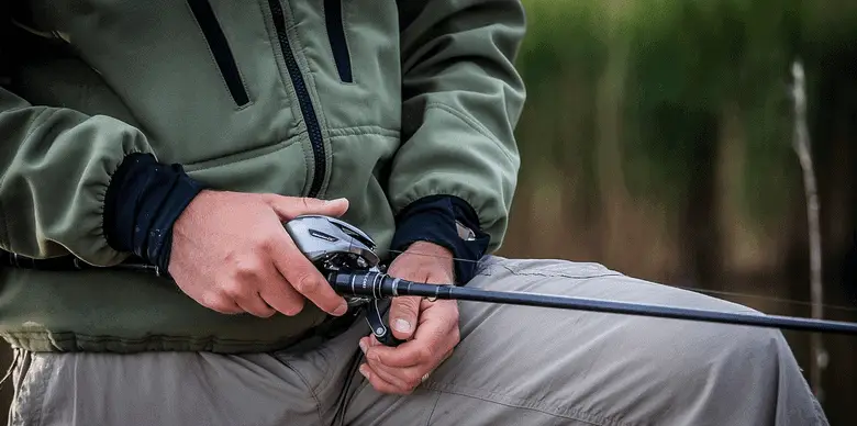 angler holding a casting rod